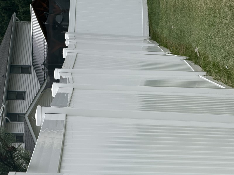 A run of fence posts each leaning at a different angle, with the top rail line sagging between them.
